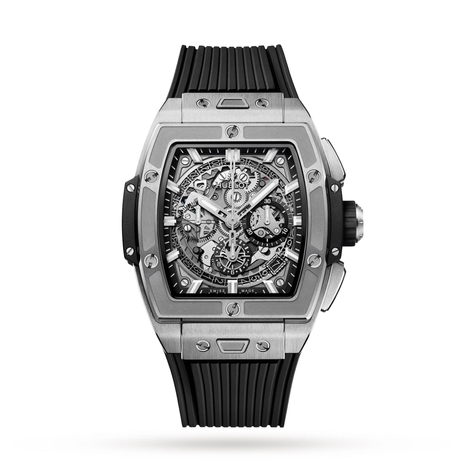 The Hublot Spirit of Big Bang Titanium is a luxury rectangular silver watch with a titanium case, skeleton dial, chronograph features, black screws, and a black ribbed rubber strap, shown against a white background.