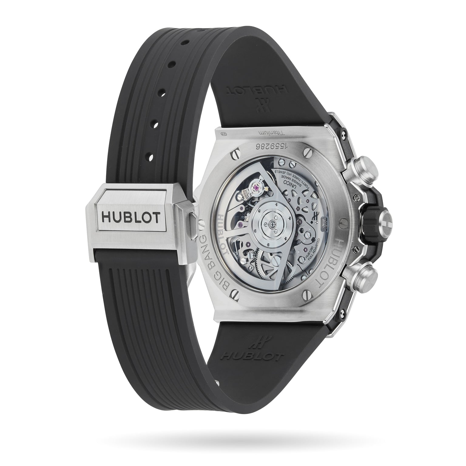 Rear view of the Hublot Big Bang Unico Titanium wristwatch showing its UNICO chronograph flyback movement through a transparent case back, paired with a black rubber strap and distinctive Hublot branding.