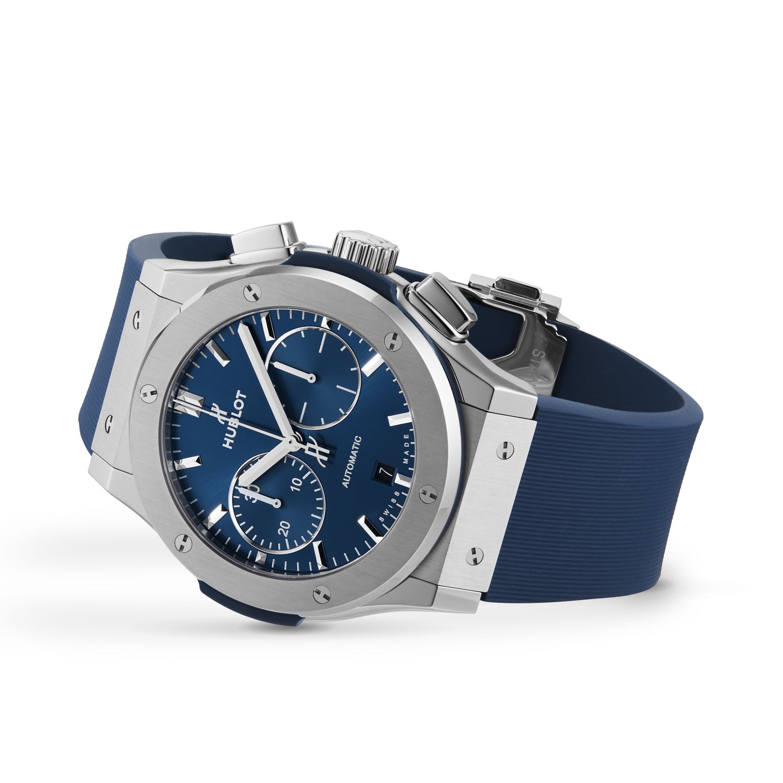 The Hublot Classic Fusion Chronograph Titanium Blue wristwatch, with a blue dial and blue rubber strap, is shown at an angle on a white background.