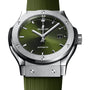 The Hublot Classic Fusion Titanium Green features a green dial, silver hour markers, automatic movement, date at 3 o’clock, and a matching green textured strap.