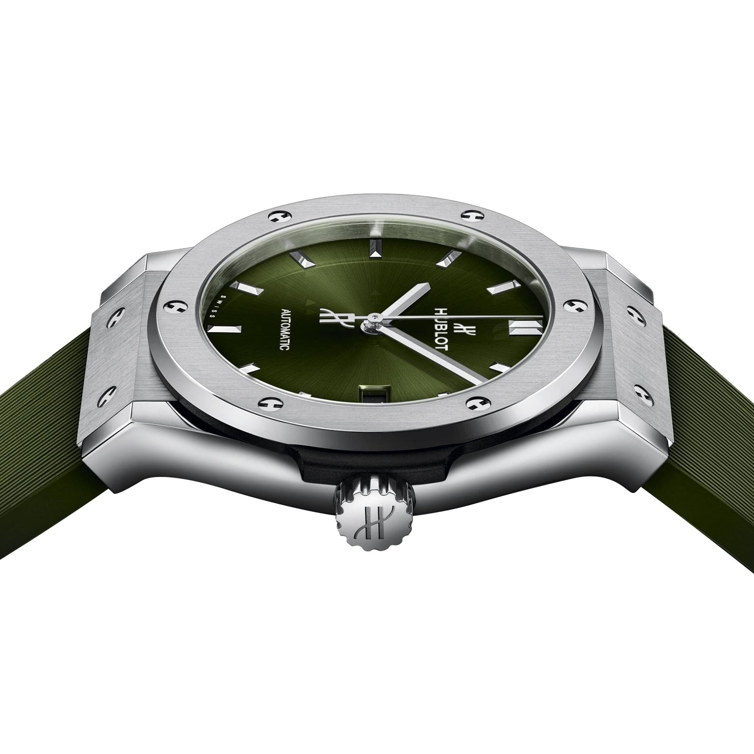 A close-up side view of the Hublot Classic Fusion Titanium Green wristwatch, featuring a green dial and strap, titanium case with visible bezel screws, and automatic movement.