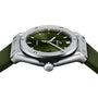 A close-up side view of the Hublot Classic Fusion Titanium Green wristwatch, featuring a green dial and strap, titanium case with visible bezel screws, and automatic movement.