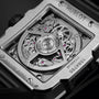 Close-up of the Hublot Square Bang Unico Titanium caseback, highlighting the detailed Unico movement and engraved specifications on its durable titanium case.