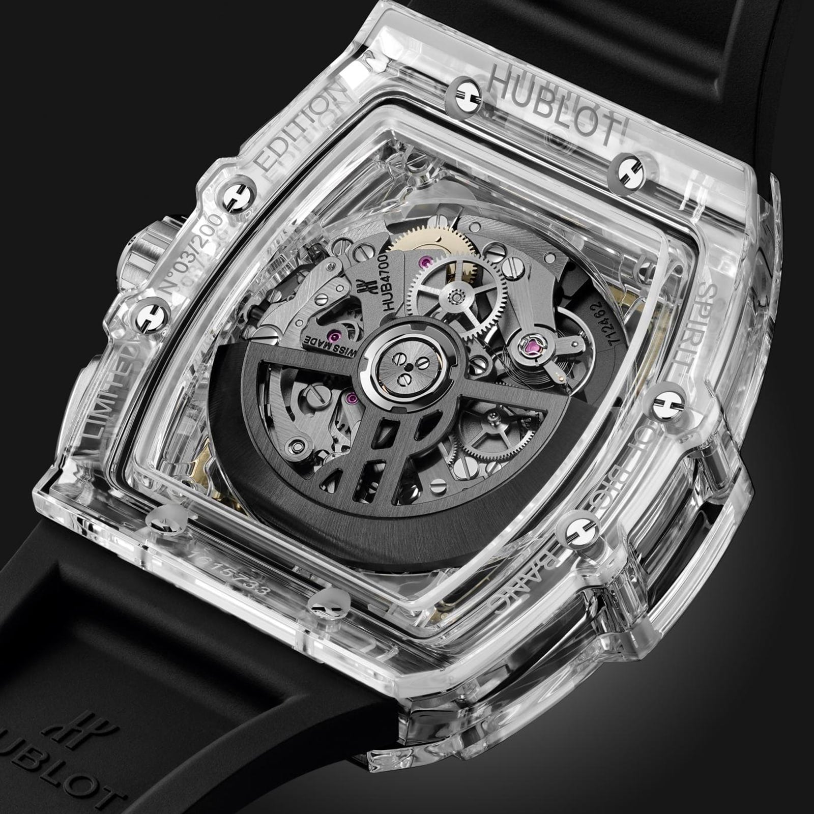Close-up of the Hublot Spirit Of Big Bang Magic Sapphire, featuring a sapphire crystal case, visible mechanical gears, a black rubber strap, and limited edition markings on this self-winding chronograph.