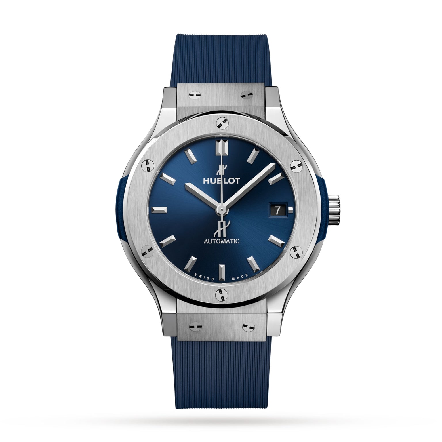 The Hublot Classic Fusion Titanium Blue features a blue dial, titanium case, silver hour markers, date at 3 o’clock, and a blue rubber strap, shown on a white background.