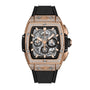 The Hublot Spirit Of Big Bang King Gold Pavé is a luxury watch with a King Gold alloy, diamond-encrusted rectangular case, skeletonized design showing intricate gears, chronograph dials, and a black rubber strap.