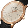 The Girard-Perregaux 1966 40 is a timeless icon with a pink gold case, beige dial, black leather strap, date at 3 oclock, and simple hour markers.