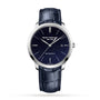 The Girard-Perregaux 1966 Orion is a luxury wristwatch with a dark blue aventurine dial, silver hands, date display at 3 o’clock, and a blue leather strap, powered by the precise GP03300 movement.