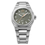 The Girard-Perregaux Laureato 38 is a silver wristwatch featuring a textured green dial and a matching metal bracelet.