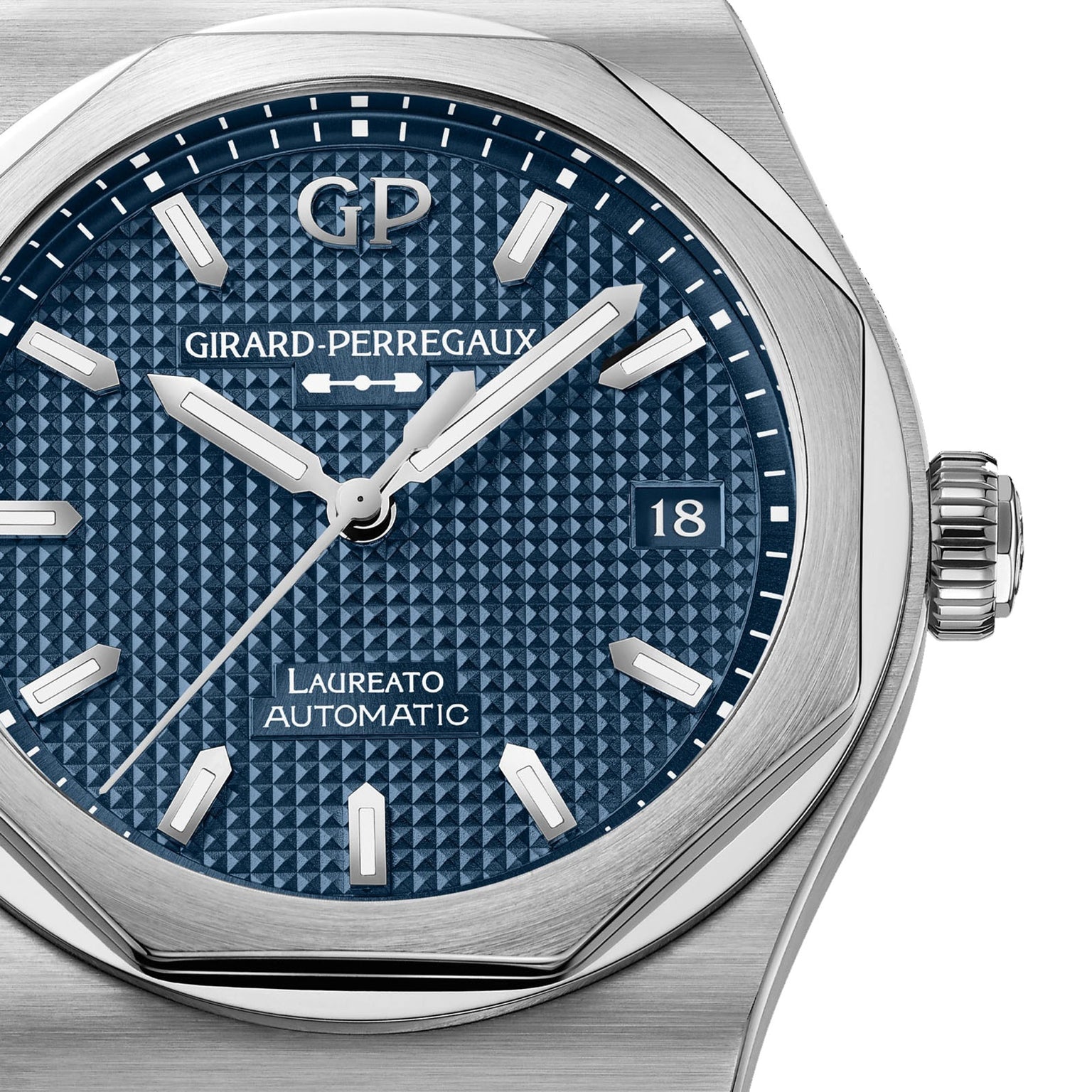 Close-up of a Girard-Perregaux Laureato 38 watch featuring a blue textured dial and silver hands.