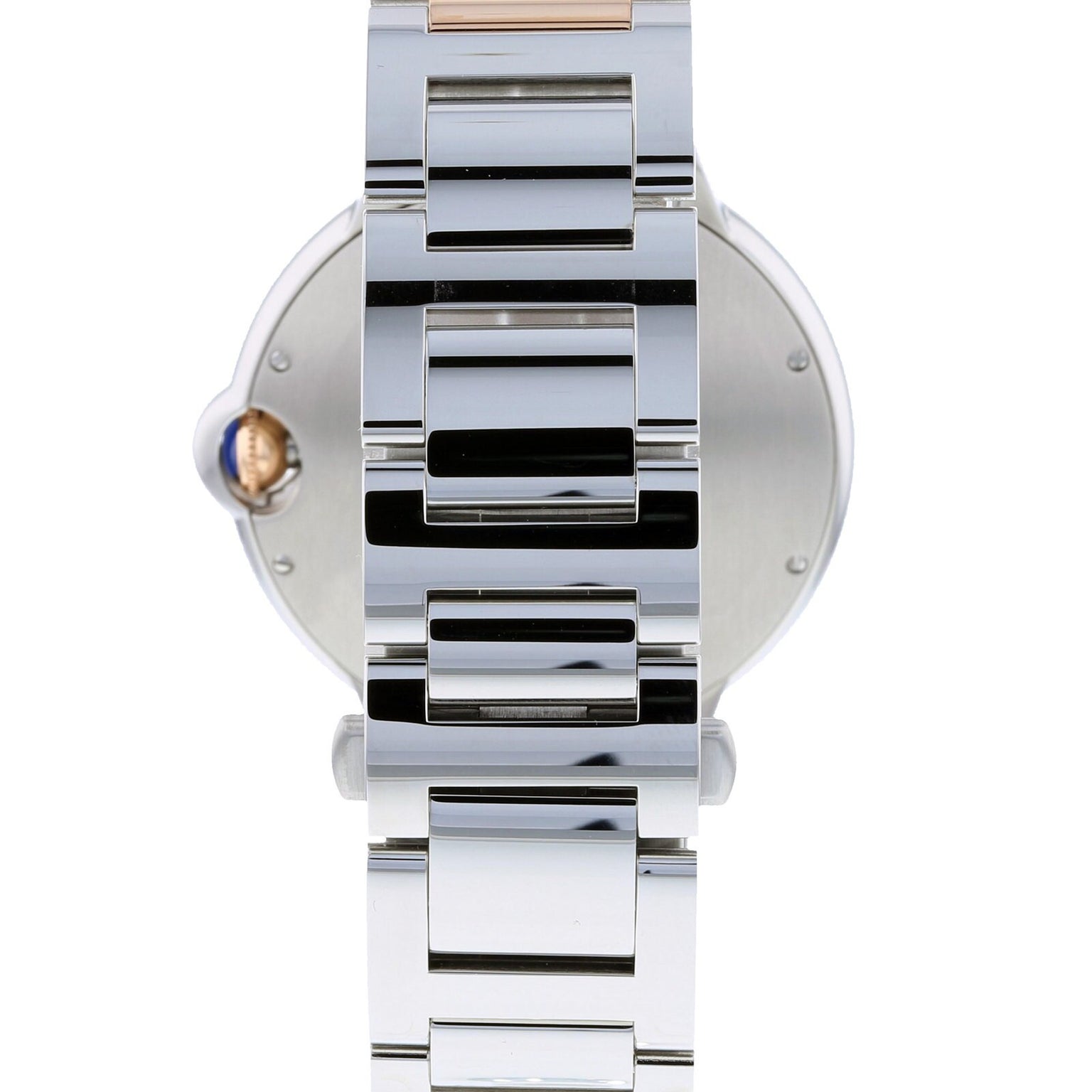 Close-up of the back of a Cartier Ballon Bleu de Cartier wristwatch featuring a polished silver metal link bracelet and a crown visible on the left side of the case.