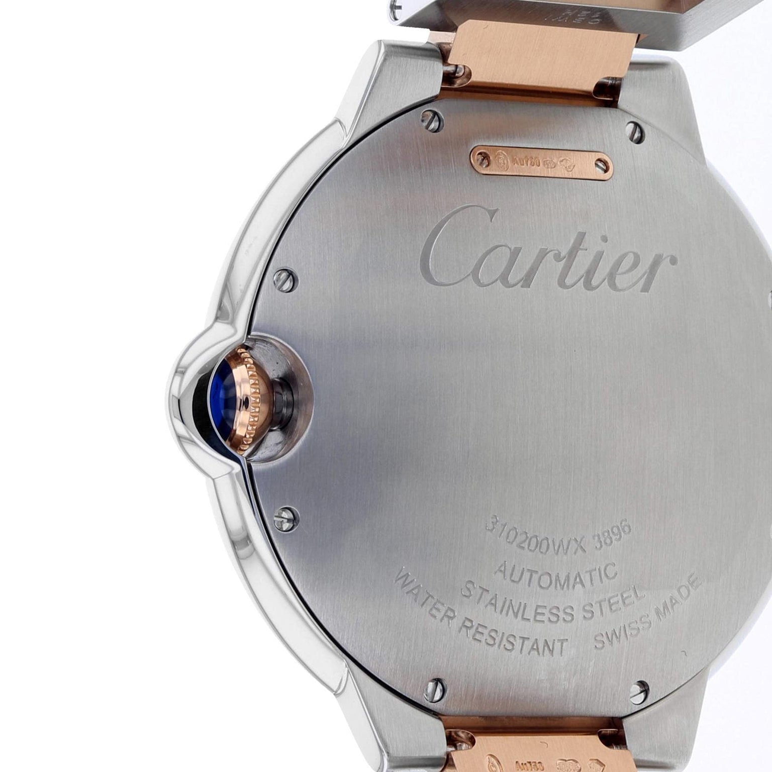 Close-up of the back of a Ballon Bleu de Cartier watch by Cartier, featuring engravings, a stainless steel case, rose gold accents, and a blue cabochon crown.