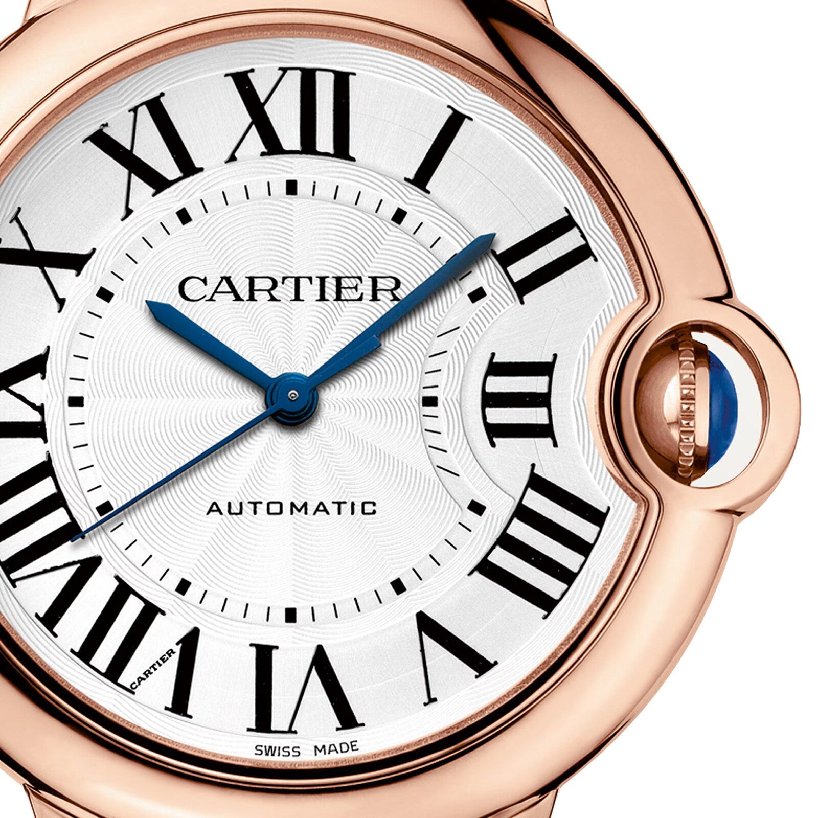 Close-up of the Cartier Ballon Bleu de Cartier watch, showcasing a white guilloché dial, black Roman numerals, blue hands, and a pink gold case with a crown set with a blue cabochon.