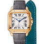 The Santos de Cartier by Cartier features an 18K rose gold square case, white dial with Roman numerals, blue hands, a grey leather strap, and teal lining.