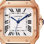 Close-up of a Santos de Cartier watch face with Roman numerals, blue hands, and an 18K rose gold case by Cartier, displaying the time 10:08.