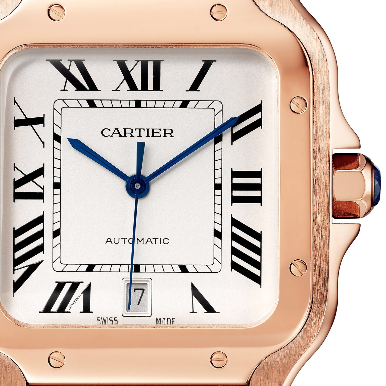 Close-up of the Cartier Santos de Cartier watch face featuring Roman numerals, blue hands, a 6 o’clock date window, and an 18K rose gold case with the calibre 1847 MC movement.