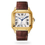 The Santos de Cartier watch by Cartier features an 18K yellow gold square case, white dial with Roman numerals, blue hands, and a brown leather strap.
