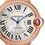 Close-up of the Ballon Bleu de Cartier watch by Cartier, featuring Roman numerals, blue hands, and a diamond bezel.