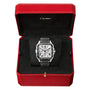 A Santos de Cartier Chronograph by Cartier, featuring a square face and Roman numerals, is displayed in an open red Cartier box with a black interior, highlighting the elegance of the brand.