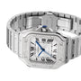The Cartier Santos de Cartier features a silver square face, Roman numerals, blue hands, diamond bezel, stainless steel bracelet, and automatic movement.
