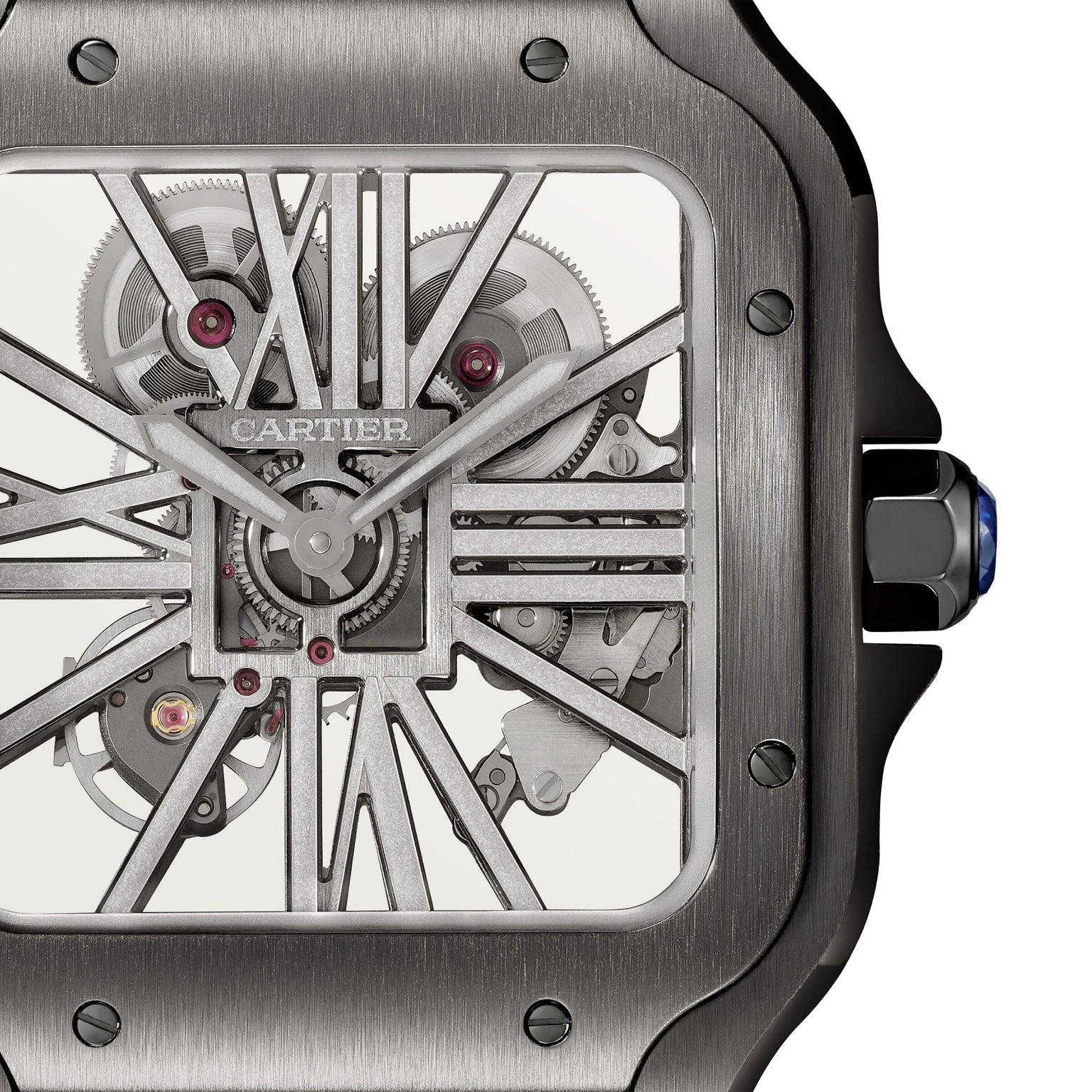 Close-up of the Cartier Santos de Cartier Skeleton watch face highlights its mechanical movement, visible gears, and brushed metal frame.