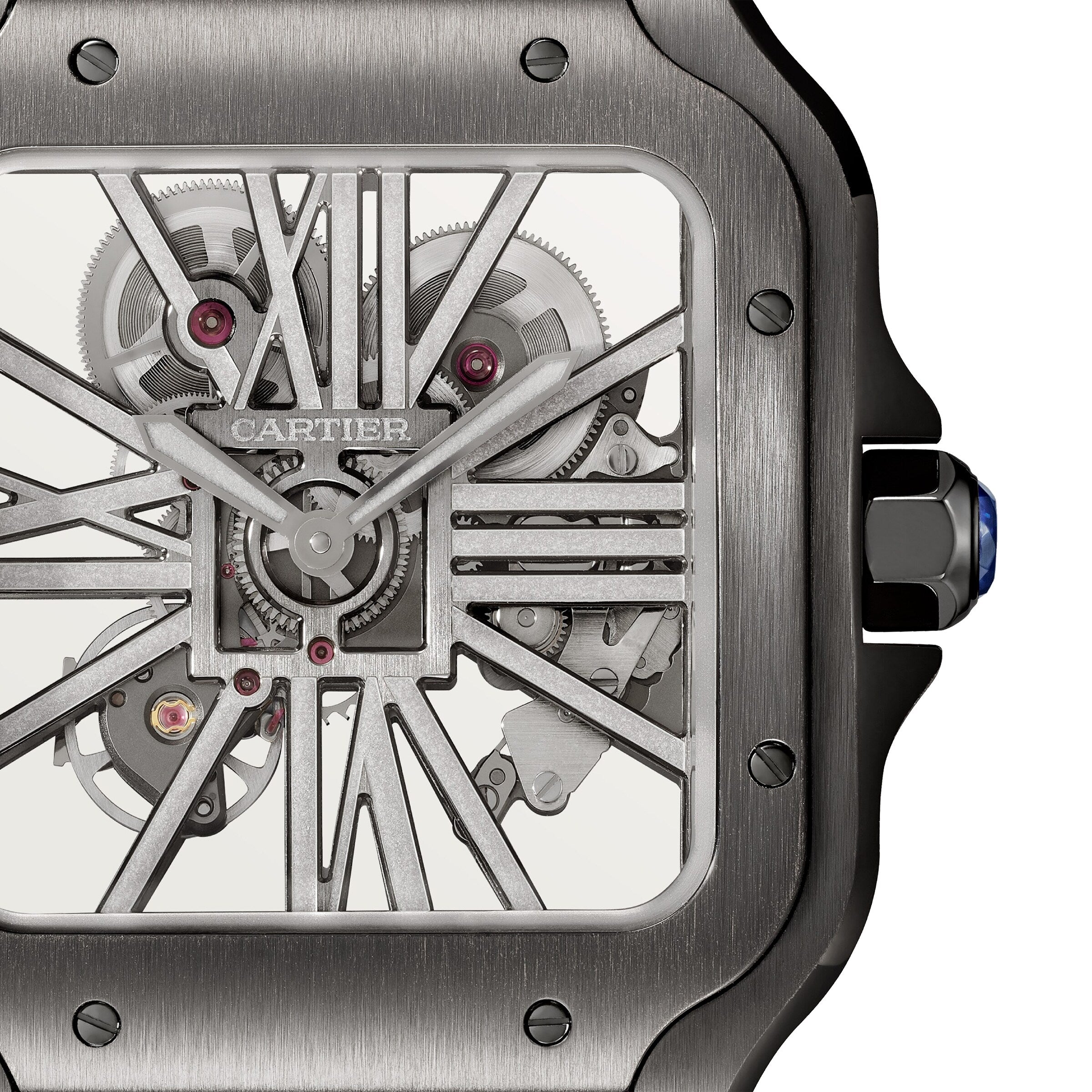 Close-up of the Cartier Santos de Cartier Skeleton watch face highlights its mechanical movement, visible gears, and brushed metal frame.