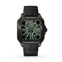 The Cartier Santos de Cartier Skeleton is a square-faced black watch with a skeleton dial, green luminous Roman numerals, black leather strap, and is powered by a manufacture mechanical movement.