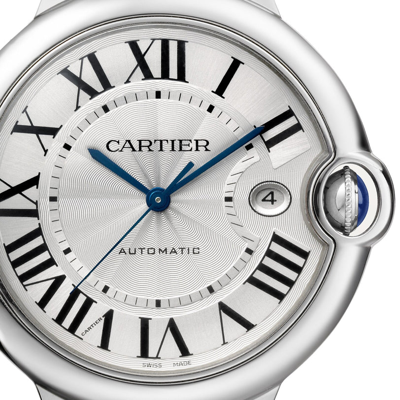 Close-up of the Ballon Bleu de Cartier by Cartier, featuring a silver textured dial with Roman numerals, blue hands, and a date window at 3 o’clock—radiating timeless elegance.