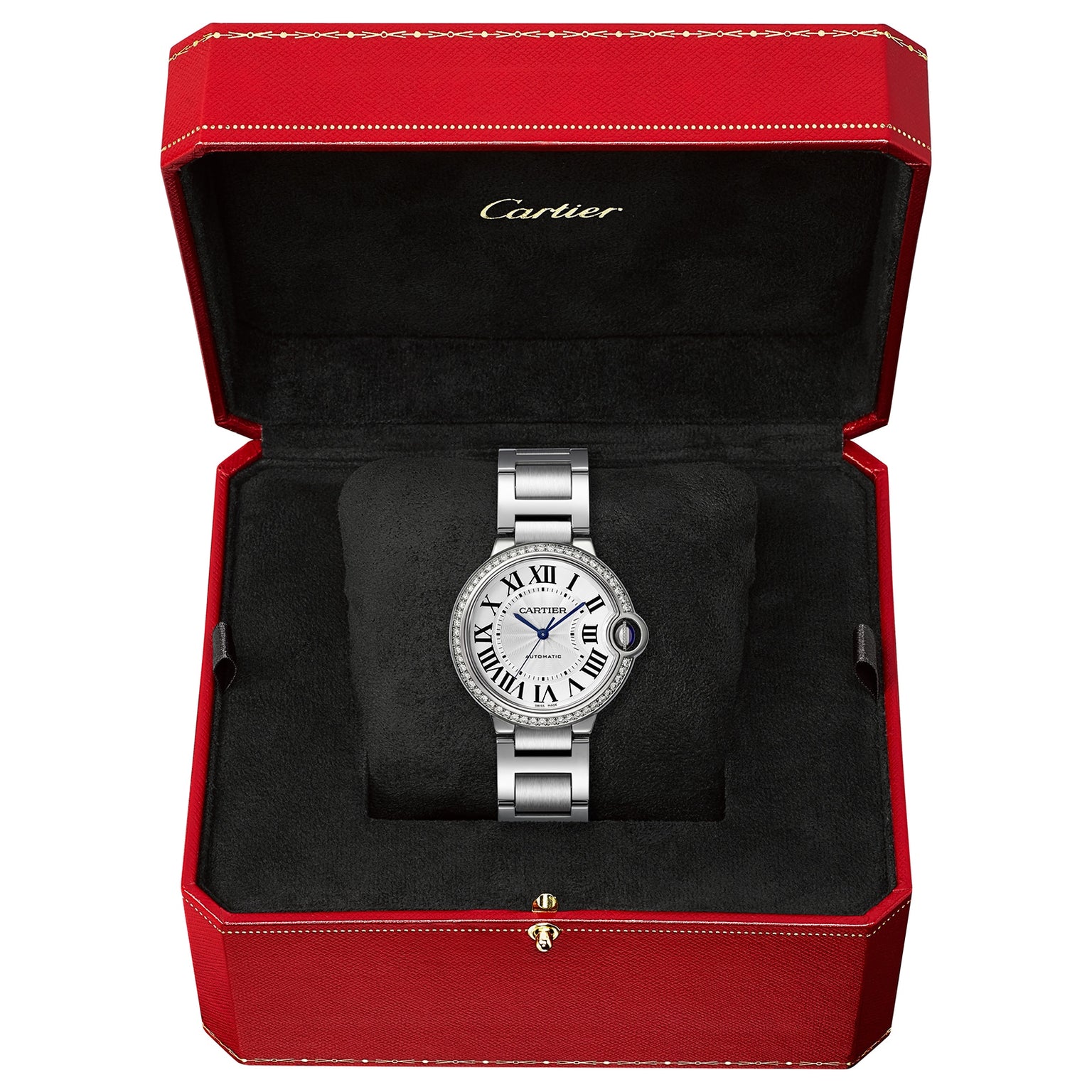A Cartier Ballon Bleu de Cartier watch with Roman numerals and mechanical movement is shown in an open red and black Cartier box.