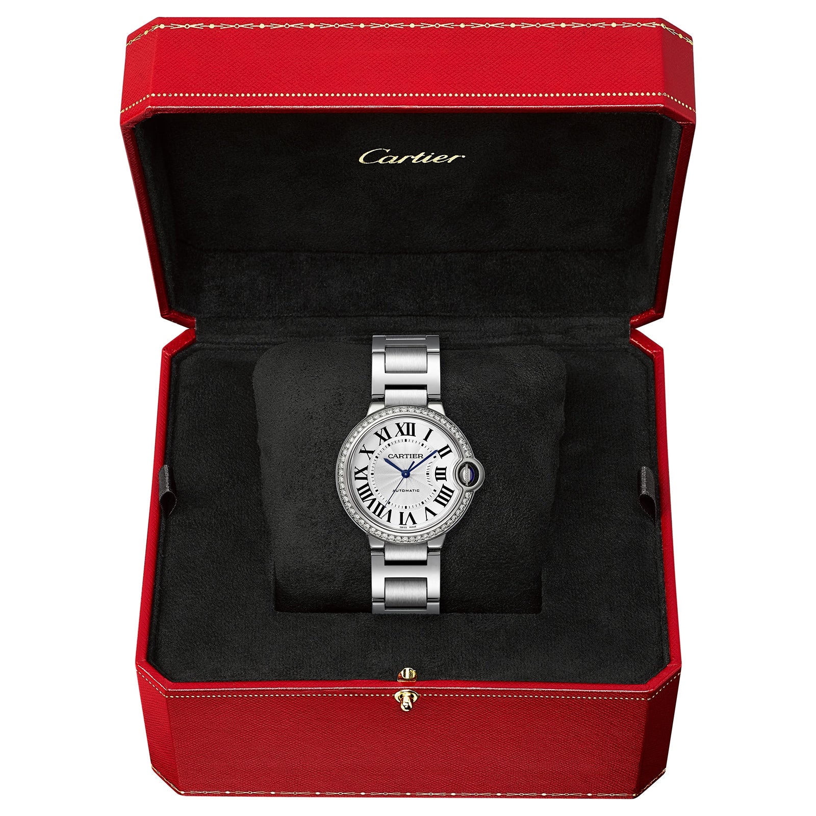 A Cartier Ballon Bleu de Cartier watch with Roman numerals and mechanical movement is shown in an open red and black Cartier box.