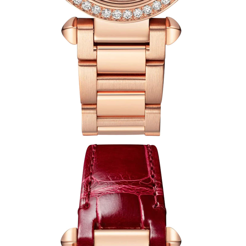 Close-up of the Cartier Pasha de Cartier watch with a rose gold bracelet on top and a burgundy leather strap below, both shown vertically against a white background.