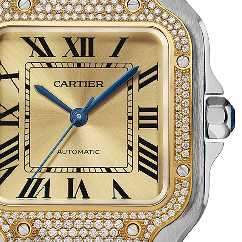 Close-up of a Santos de Cartier Chronograph watch face with Roman numerals, blue hands, a gold background, and a diamond bezel highlighting its elegant mechanical movement.