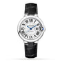 The Cartier Ballon Bleu de Cartier watch features a silver round face, black Roman numerals, blue hands, and an elegant black alligator leather strap.