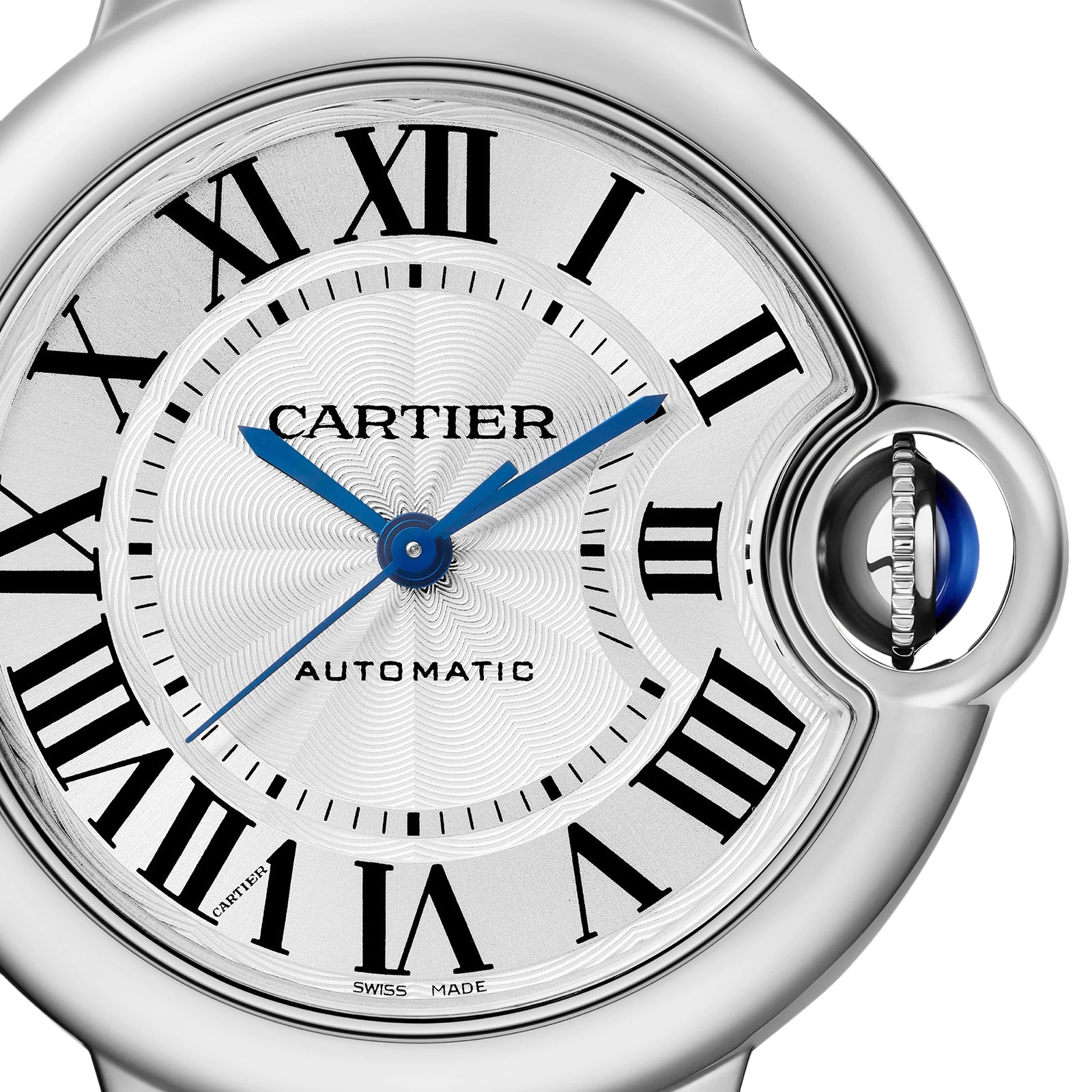 Close-up of the Ballon Bleu de Cartier watch face featuring Roman numerals, blue sword-shaped hands, automatic movement, and a crown adorned with a blue cabochon.