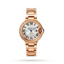 The Cartier Ballon Bleu de Cartier wristwatch features a rose gold case, diamond bezel, Roman numeral markers, blue hands, automatic movement, and a metal link bracelet, displayed against a white background.