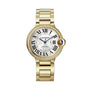 A Cartier Ballon Bleu de Cartier yellow gold watch with a round face, Roman numerals, blue hands, diamond bezel, and metal link bracelet is shown on a white background.