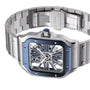 The Cartier Santos de Cartier Skeleton, a stainless steel watch with a square blue bezel, visible skeletonized movement, and metal bracelet, is displayed at an angle.