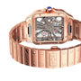 The Santos de Cartier Skeleton by Cartier features a rose gold rectangular case, skeleton dial with visible mechanics, matching metal bracelet with screw details, engraved clasp, and SmartLink adjustment system.
