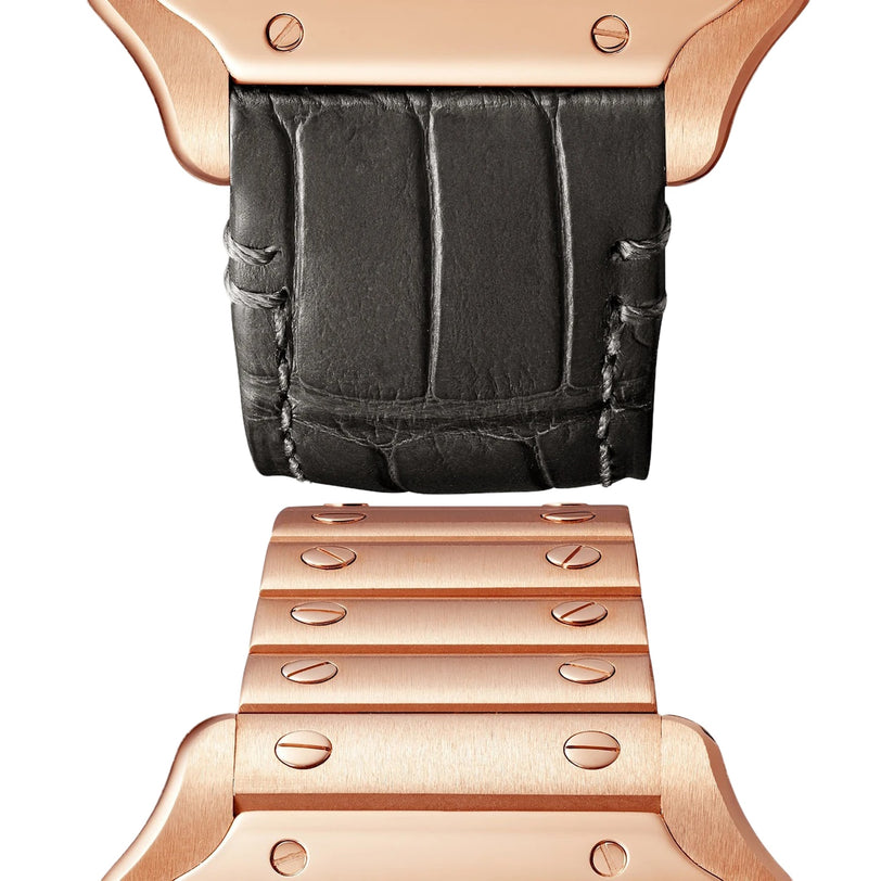 Close-up of a Cartier Baignoire watch strap with a black leather upper section and a rose gold metal lower section accented by visible screws.