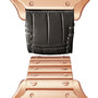 Close-up of a Cartier Baignoire watch strap with a black leather upper section and a rose gold metal lower section accented by visible screws.
