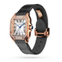 The Santos de Cartier by Cartier features a black leather strap, rose gold case, diamond-set bezel, Roman numeral dial with blue hands, and automatic movement.