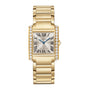 A gold rectangular Cartier Tank Américaine wristwatch with Roman numerals, blue hands, brilliant-cut diamonds on the sides, yellow gold case, and a gold link bracelet.