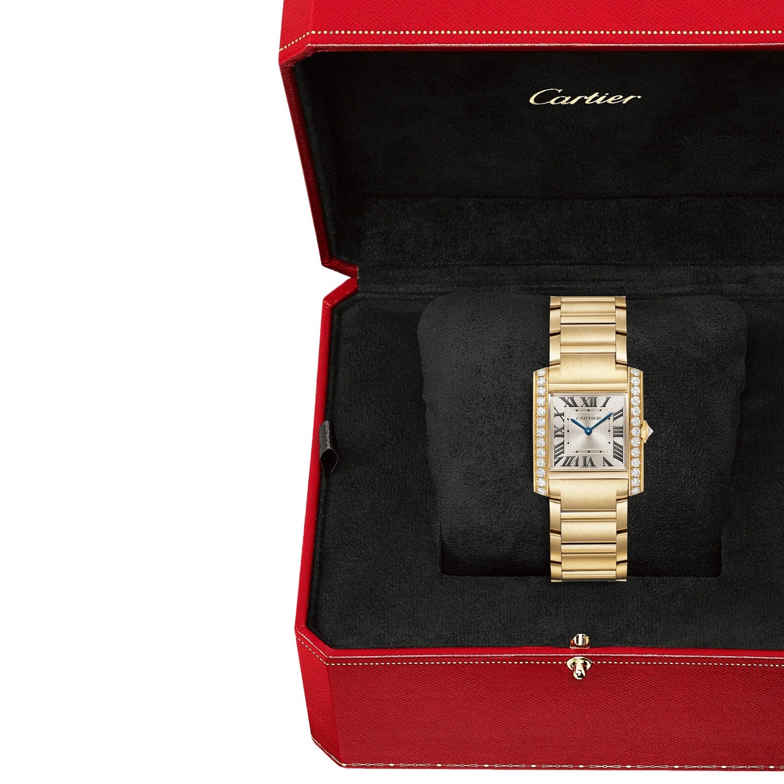A gold Cartier Tank Américaine wristwatch with a rectangular face and brilliant-cut diamonds is displayed in an open red Cartier box with a black interior.