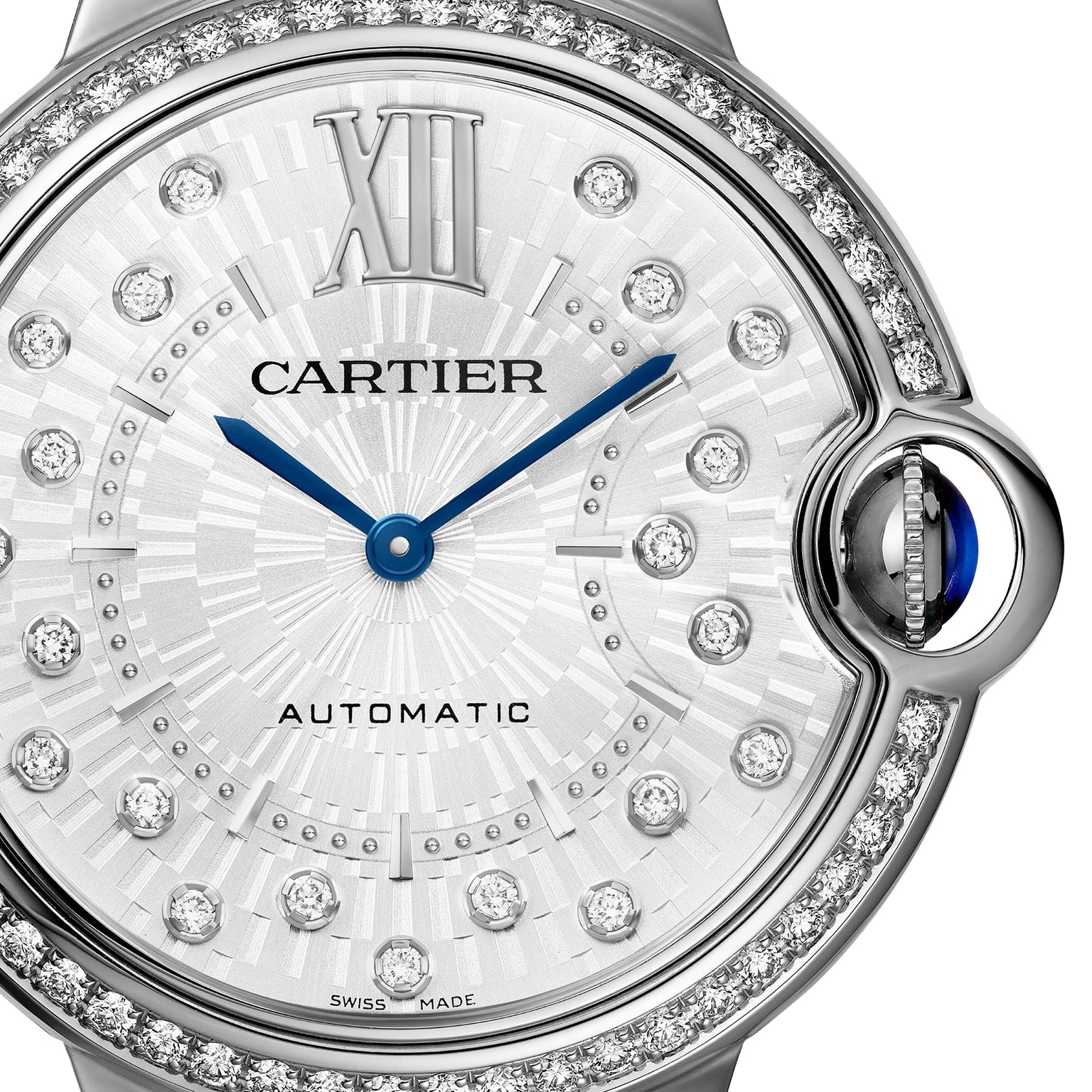 Close-up of the Cartier Ballon Bleu de Cartier watch face featuring a sunray grey dial, blue hands, diamond hour markers, Roman numeral XII, CARTIER and AUTOMATIC text, a blue cabochon crown, and an interchangeable steel bracelet.