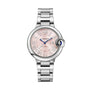 The Ballon Bleu de Cartier by Cartier is a silver wristwatch featuring a pink dial, Roman numerals, and a blue cabochon crown.