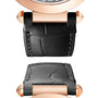 Close-up of the Pasha de Cartier by Cartier featuring a black leather strap with rose gold lugs and detailed stitching.