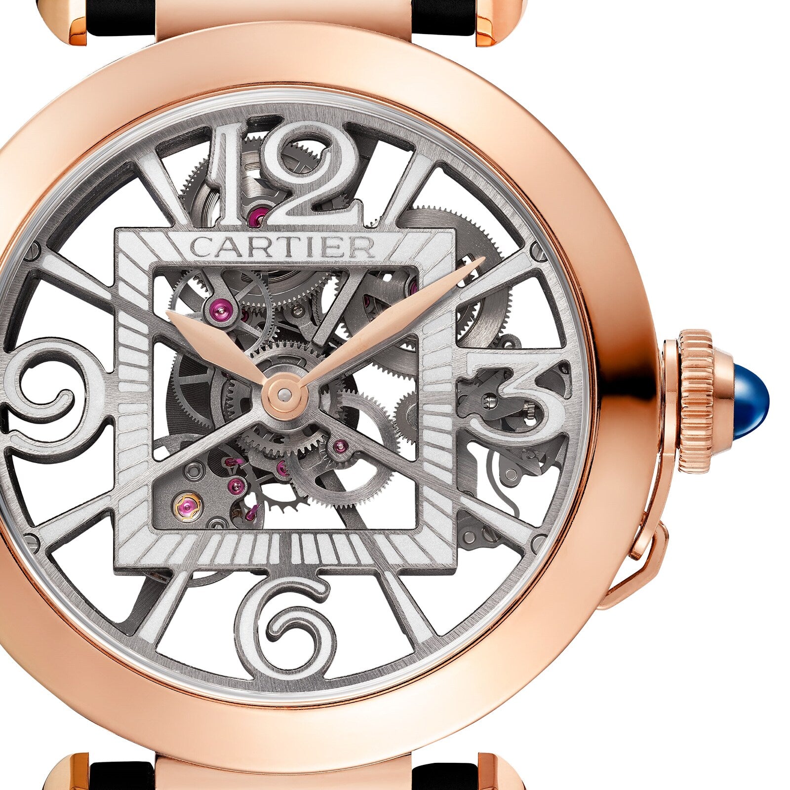 A close-up of the Pasha de Cartier by Cartier, featuring exposed gears, a rose gold case, and a blue cabochon crown.