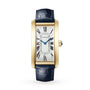 The Cartier Tank Américaine is a rectangular gold watch featuring a blue leather strap and a Roman numeral dial on a white background.