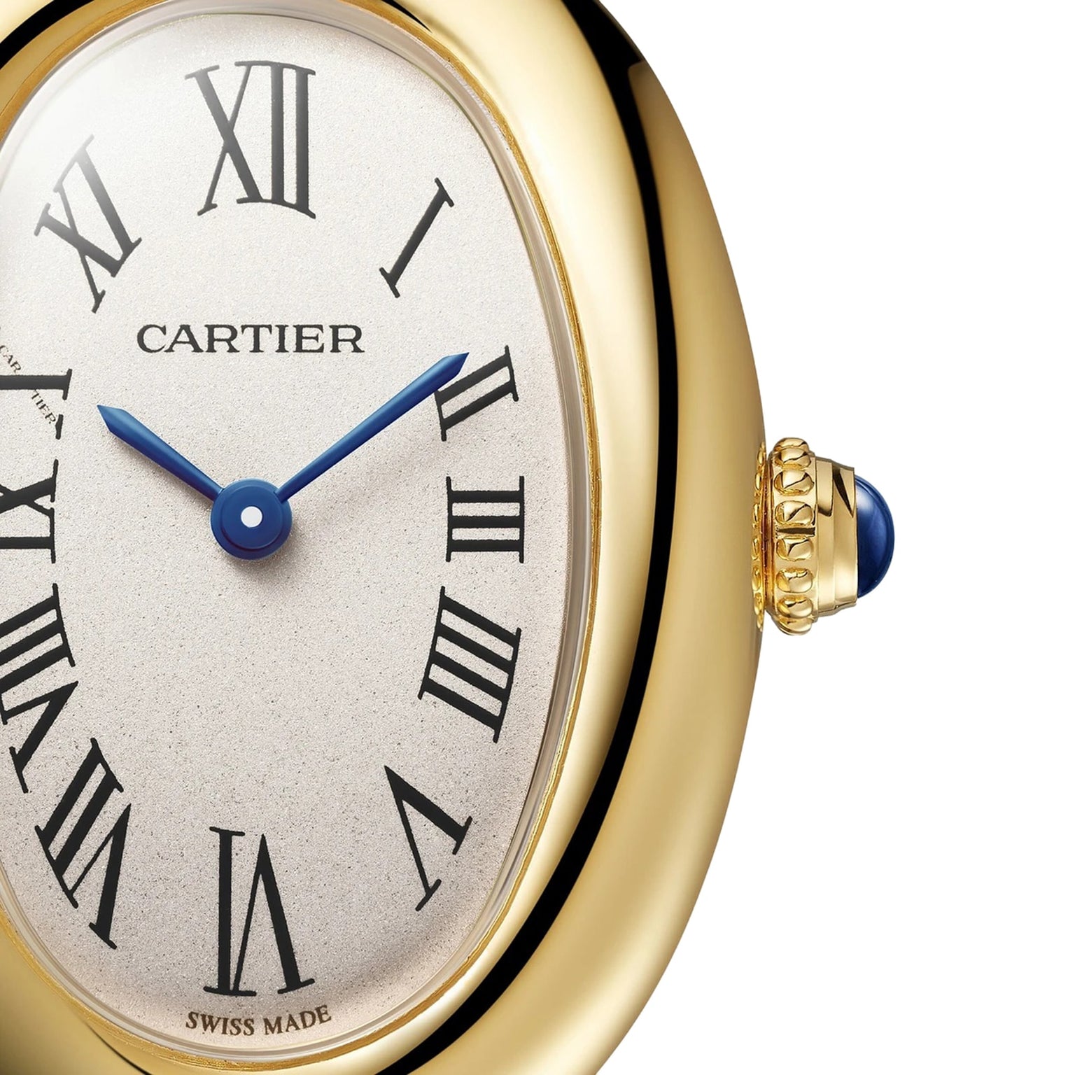 Close-up of a gold Cartier Baignoire watch with blue hands, Roman numerals, and a sapphire crown.