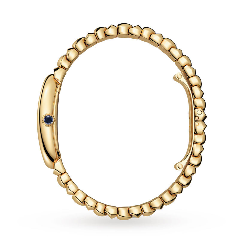 Side view of the Cartier Baignoire watch in 18K yellow gold, showcasing its rounded rectangular case, linked bracelet, blue cabochon crown, and water-resistant design on a white background.
